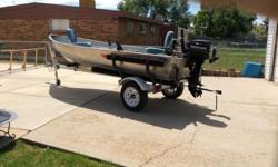 14 foot Lund fishing boat with 8 hp mer. Motor, electric minkota motor,eagle fish finder and big john down rigger.