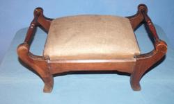 A wonderful piece, circa 1900+. Footstool shows obvious wear but is in amazingly good condition. Has one nick about the size of a half dollar. Believed to be made of walnut, use it as a footstool or great accent piece. If interested please call me @ ()