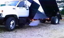 1999 gmc c6500 454 with fuel injection, with allison automatic transmission. duel hydrolics on dump beds. 8 1/2 foot side dump on front and 12 foot end dump or total 20 foot flatbed. this truck was made for hauling wood but can be used to haul whatever