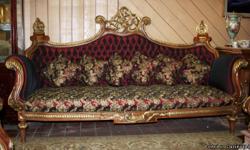 French design sofa.. crafted from fine European Beachwood.. hand carved, upholstered with burgundy metalek embroidrey