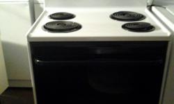 Very clean and working Frigidaire self-cleaning oven. --