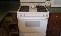 Beautiful white Frigidaire stove with self-cleaning oven. Digital clock, timer & bake temp settings. Gas line included with all couplings. Excellent condition - no dents, scratches or rust. Bottom drawer under oven - can be used for broiling or for