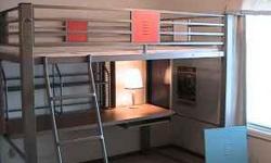 Locker themed full-sized loft bed by Powell:
*Steel Construction.
*Like new--only used for 2 years.
*Original retail price at Bedroom Expressions: over $1,000.
*Interchangeable white, light blue, dark blue, and orange locker panels create a variety of