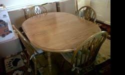 Oak Dinning Room Set, 4 chairs,table,and leaf $250.00. Three piece Entertainment Center with a 27" T.V. $200.00 Two 45" High Bar Stools with padded seats $125.00. Two Floor Rugs 8X10 and 5x7 both with paddes $100.00 each. Two Glass Medison Cabnets both