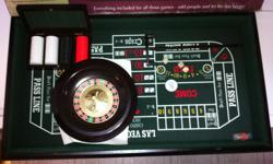 gamblers tabletop trio craps, roullette, and blackjack. new condition , all accessories call or text -- Petersburg