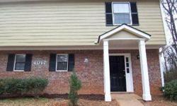 2 Story Garden Condo in Great School District. Quiet neighborhood with nearby golf club. A charming foyer welcomes you home. A brick fireplace makes the spacious living room cozy and perfect for relaxing. Kitchen includes double sink, gorgeous stone