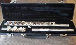 Gemeinhart Flute 22SP with case. Used 1 year in school band.