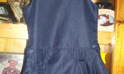 sizes ranges from 4 - 8 shorts, size 5 navy skirt , size 6 jumper.