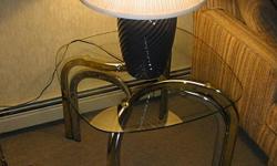Set of two glass top end tables 28"W 20"H & two ginger jar lamps CALL EMILY 561 357-7000