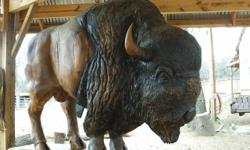 Glory is a life-size buffalo 4' x 9' x 6'high. From tip to tip his horns measure 4 feet. His body is about 3' at the biggest bulk of his powerful muscles. He is carved and colored, in intricate detail, from solid oak tree trunk chunks, glued, doweled,