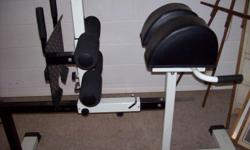 This is a genuine glute/ham machine, not a roman chair. Can also perform abdominal exercises. In perfect condition.