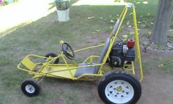 $400.00 go-cart 5hp very fast big tiers in the back yellow. very good shap. see pics call 561-688-3600 or 561-688-3600