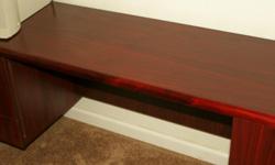 Gorgeous Executive Office Desk
Beautiful condition
Paid $1025, asking $300
? Natural hardwood with Garnet Cherry finish
? Constructed of cherry veneers and poplar solids
? three storage drawers the left side
? All drawers are mounted on easy glide metal