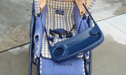 Graco Luxury Stroller. Colors of yellow and blue.
Stroller had good wheels.
Seat goes all the way making the seat into a bed.
Has a tray you can detach.
Top cup holder has a cover.
Has lots of storage on the bottom.
Very clean.