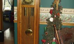 Oak grandfather clock - excellent condition.