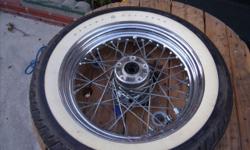 H-D front tire and rim - $75.00 (longbeacharea) condition: excellent size / dimensions: u make it fit call to pick up-----------or----------------text with offer Dunlop Tire Series- D402F MT 90 B 16 Wide White Wall With Harley-Davidson Engraved on it - 16