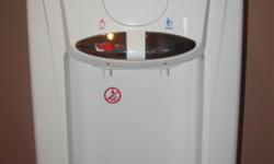 WATER COOLER HAS HOT AND COLD. HOT HAS CHILD SAFETY BUTTON. WORKS GREAT.