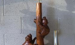 Hand carved out of deep beautiful Mahogany. These are a &nbsp;set of two matching lamps. 160.00 each -&nbsp;plus shipping.
There are 2 sweet bears climbing a tree.
Lamp shades have not been shown as they seem to be a personal choice.
If you would like