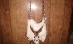 Hand crafted leather, mink and rabbit hide, purse