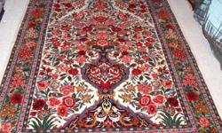 5' x 7' one of a kind custom made persian rug.