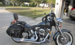 '96 Softail Special has been garage kept and
is in excellent condition.&nbsp; Custom paint,
black/grey.&nbsp;&nbsp; Bags, lots of chrome, pegs,
foot rails,&nbsp;&nbsp;&nbsp; Must see.&nbsp; Low miles.
570-470-3534
941-460-8601