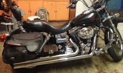 2000 Harley Davidson dyna lowrider. 1450cc Evolution.
Vance and Hines, Corbin seat, highway bars and pegs, passenger floorboards, canvas and leather saddle bags, luggage rack and lots of chrome.
This a clean and smooth bike. Runs excellent.
Books for