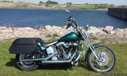 ***PRICE DROP*** 2003 Harley Davidson Softail Springer. Hard to find, tons of chrome, beautiful emerald green, very unique bike, always a head turner. - custom paint job. - Porker exhaust sounds amazing. - 10 inch mini apes on 3 inch dog bone riser. - New