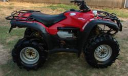 I have a 2005 Honda Foreman 500 that I just had the engine rebuilt on less than five hours of running time ago by a powersports buisness. I am looking to sale or trade for a travel trailer, r.v or one that is a motorhome, that is camp type with a