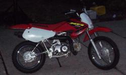 Honda XR 70R 2003 dirt bike. Great for beginner rider. Helmet and chest protector included. Call --