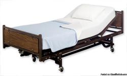 Semi-Electric Bed that offers motorized control positioning of the upper and lower body and manual bed-height adjustment. The bed includes buttons that adjust positioning of the back/head and legs. Also, the Single Crank model allows for the bed height to