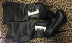 ***price reduced*** Absolutely gorgeous boots! Soft leather, size 8 boots. Only wore once. There is one small scuff on each boot. The bottoms and heel tips are in great shape. They are Shi brand by Journeys shoes. They were on sale when I bought them and