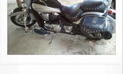 Black and gray kawasaki Vulcan 900, 2007 model, 18,000 miles on it, very clean bike , good tires on it, new battery, garage kept, clear title to it ready to ride.