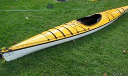 QCC 400X Graphite/Kevlar Composite Sea&nbsp;Kayak 15' 3"; 44lbs. Suitable for 120-180 lb kayakers. Speedy yet stable. - Excellent condition;garage housed. Yellow deck, white hull, Smart Track Rudder, Thigh braces. Package includes Seal Tropic Skirt (Royal