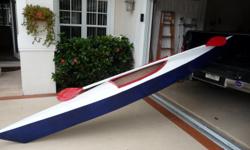 15 feet long, homemade from plans, sturdy fiberglass and carpeted inside, includes a $89.00 lightweight carbon fiber paddle