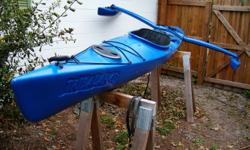 17' Tribalance Kayak. Fast, Light, fun and great for fishing. Will not tip over with Outriggers. Two large storage compartments. Use with or without outriggers. Paddle and foam car carrier included. Confortable seat.