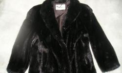 Beautiful full-length ladies mink coat. Size 16. Great condition.