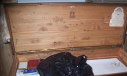 It is dark wood and cedar lined.&nbsp; $300 with the comforter inside, $250 without the comforter.&nbsp; Would be a good storage unit or hope chest.&nbsp;
&nbsp;
Thank you.