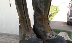 These boots have been worn 1 time. They are very nice Insulated Camo Rubber boots, size is 14.