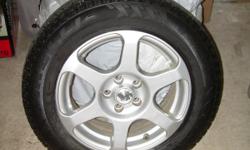 Includes silver alloy wheels, correct lug nuts and 315 MHz tire pressure sensors
&nbsp;
TIRES:&nbsp;&nbsp;&nbsp;&nbsp;&nbsp;&nbsp;&nbsp;&nbsp;&nbsp;&nbsp; 195/65R15 Pirelli Winter Carving Edge ? These were used 2 Â½&nbsp; winters in&nbsp;Golden Colorado,