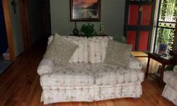 loveseat cream with sage and mauve accent colors gd cond. call --