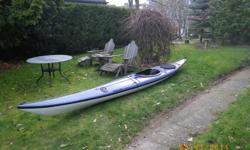 single 17'7" sea kayak with sliding seat. Great boat in good shape with no dings. this is an ideal kayak for a large person and lots of room for camping gear. the kayak can handle most conditions and is excellent in wave and currents, yet stable enough to