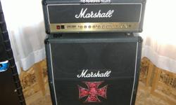Marshall JCM 2000 DSL 100 watt guitar tube amp. Great sound and comes with the Marshall 4x12 speaker cabinet as well. This amp is used and has minor dings, but still fully capable of doing it's job. Also has 2 channel footswitch included. Full EQ and