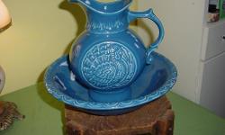 Unusual Blue McCoy Turkey pitcher and basin .&nbsp; Very Pretty&nbsp; Excellent condition No chip or cracks.&nbsp; Pitcher is 10" tall and basin is 12" wide.&nbsp;&nbsp;&nbsp;&nbsp;&nbsp; Phone&nbsp; --