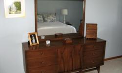 This is a compete Broyhill Brasilia bedroom set in wonderful vintage condition with very clean fronts, tops surface and sides. It includes a stunning Mid Century Modern vintage retro triple dresser. This furniture appreciates in value over time if
