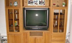 Lighted, 3 pc. Solid Oak Entertainment Center w/35" Toshiba colored TV $300 OBO
Set of lamps 50.00. All great condition.