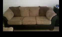 Multi Colored Sofa in good condition (shades of brown)