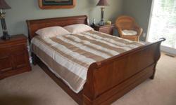 Complete National Mt Airy Louise Phillipe Queen bedroom set includes sleigh bed, two night stands, six drawer dresser and an armoire. This furniture is solid cherry and cherry veneer. This furniture is in excellent condition.
National Mt Airy, a North