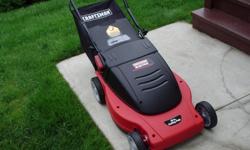 This is a new corded electric mulching lawn mower,