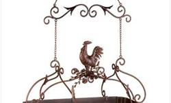 COUNTRY ROOSTER KITCHEN RACK
Attractive overhead rack puts your pots and pans right within easy reach; a must-have for any serious chef! Jaunty rooster and scrollwork theme and rich rust-red finish add informal elegance to your kitchen.
Weight 7.8 lbs.