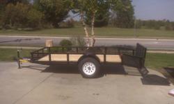 utility trailers new 2011 6x10 dove tail features are 6x10 wood floor 2x10 planks additional 2 ft mesh dove tail with 2foot heavy duty drop down gate,new 15" wheels and tires,3500# axle ,ez lube bearings,paint is 1coat rust proof primer,2 coats premium